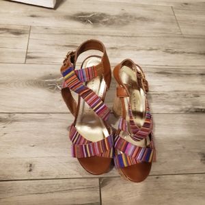 Adorable sandals with a Bohemian vibe, super cute on, cork sole, super sturdy.